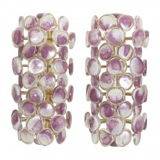 Pair of brass sconces with purple disks